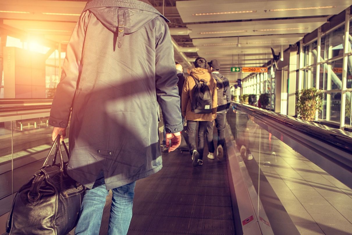 People walking through a terminal