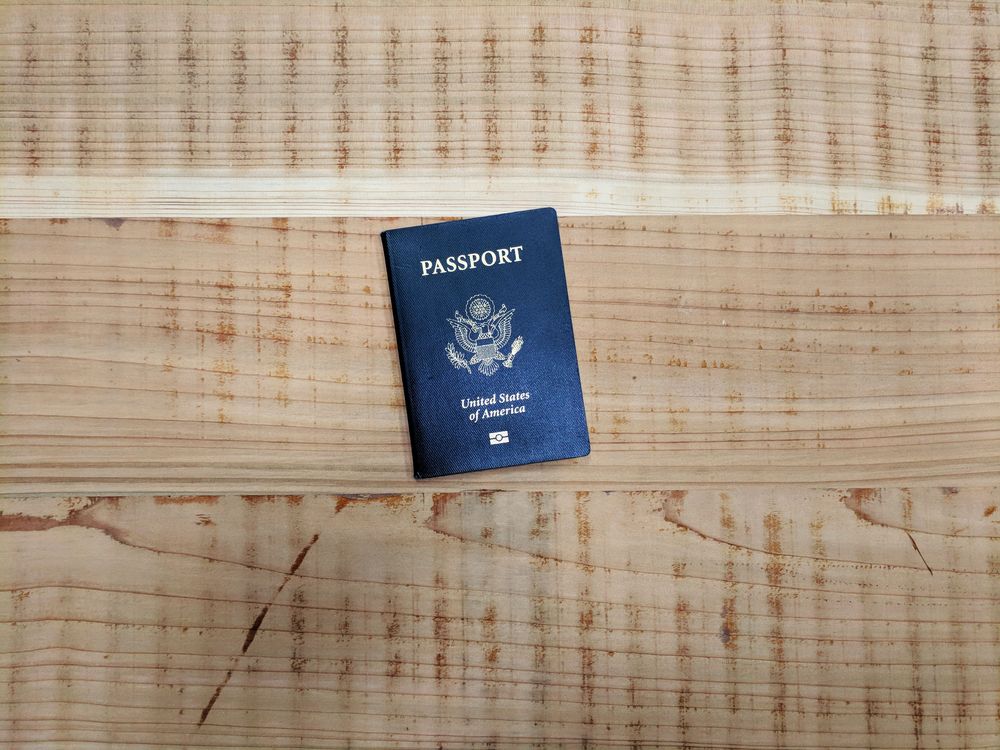 Passport laying on a table